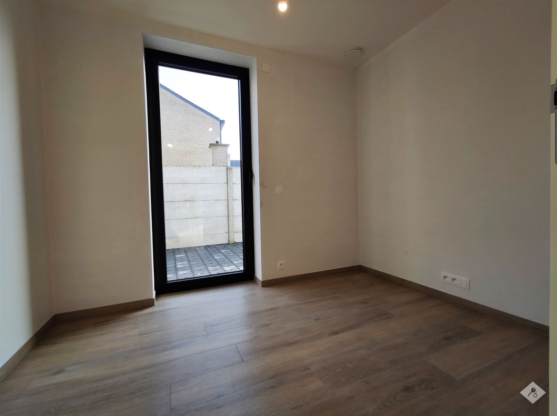 Prachtig gelijkvloers appartement met tuin in hartje Buggenhout foto 7