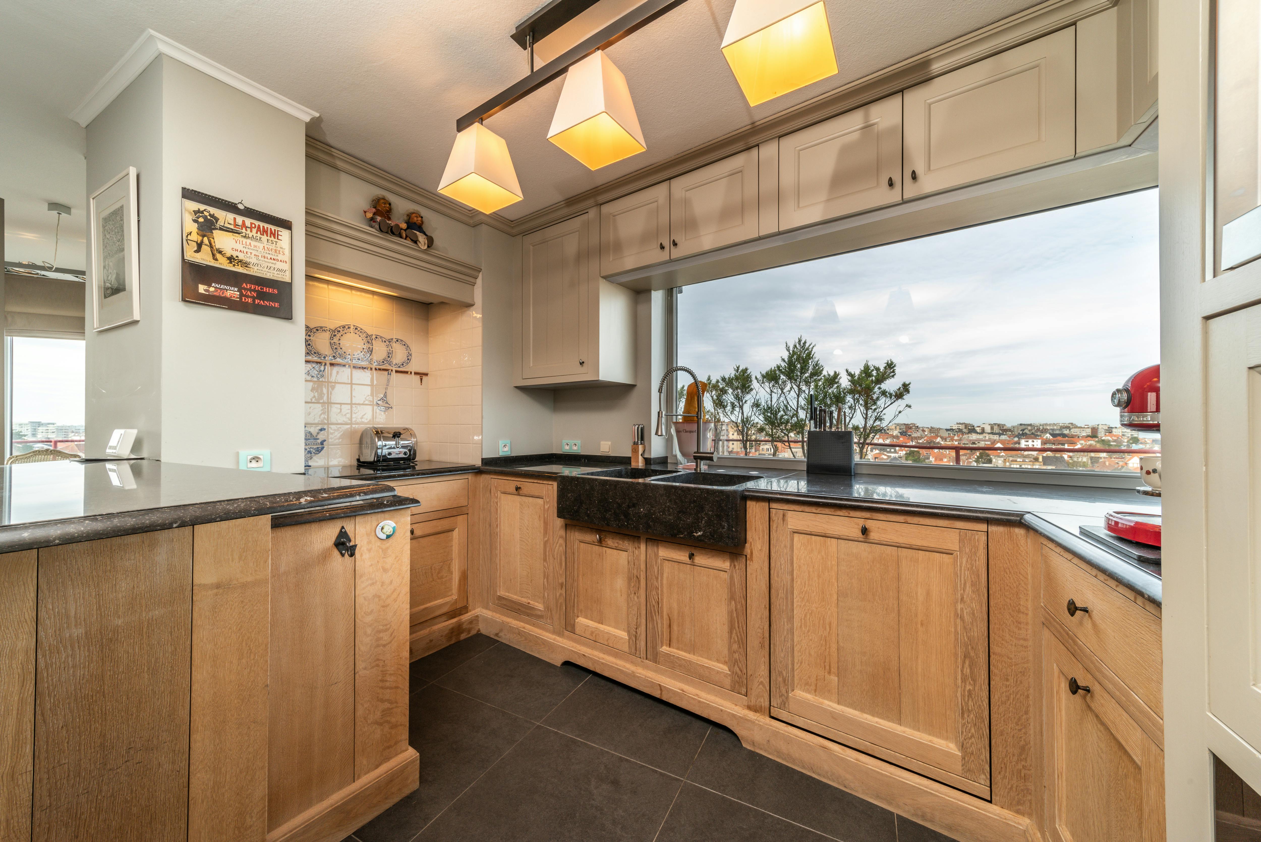 Penthouse met magnifiek zicht op de markt van De Panne foto 3