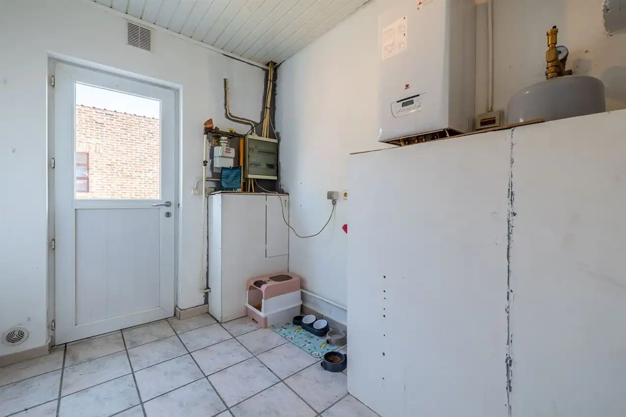 Verzorgde woning met 2 slpk., tuin en garage foto 24