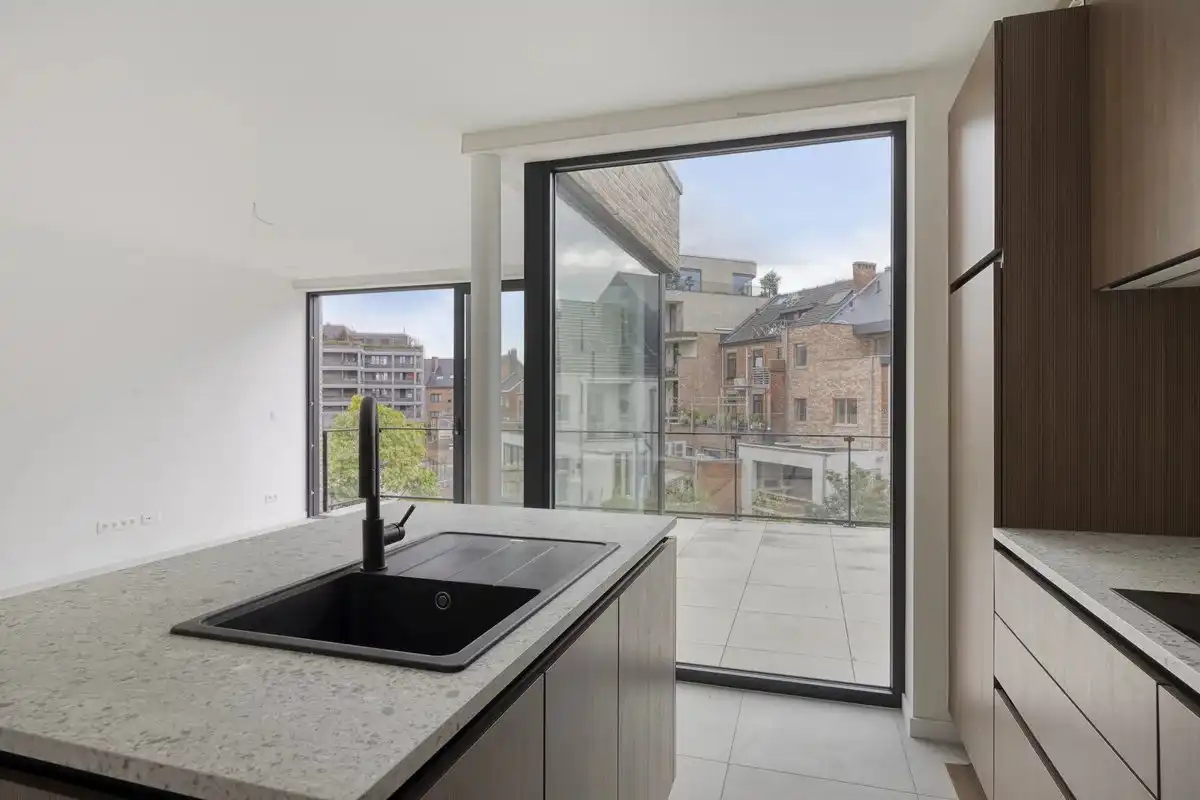 PRACHTIG NIEUWBOUWAPPARTEMENT MET 2 SLPK'S IN CENTRUM HASSELT foto 16