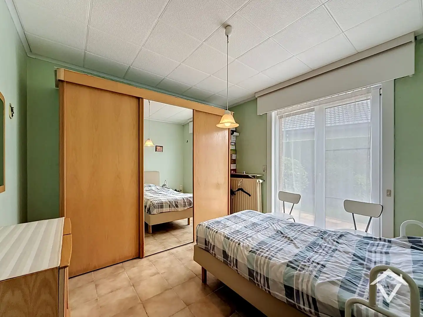 Gelijkvloerse woning met 3 slaapkamers, tuin en garage in een doodlopende straat te Roeselare foto 9