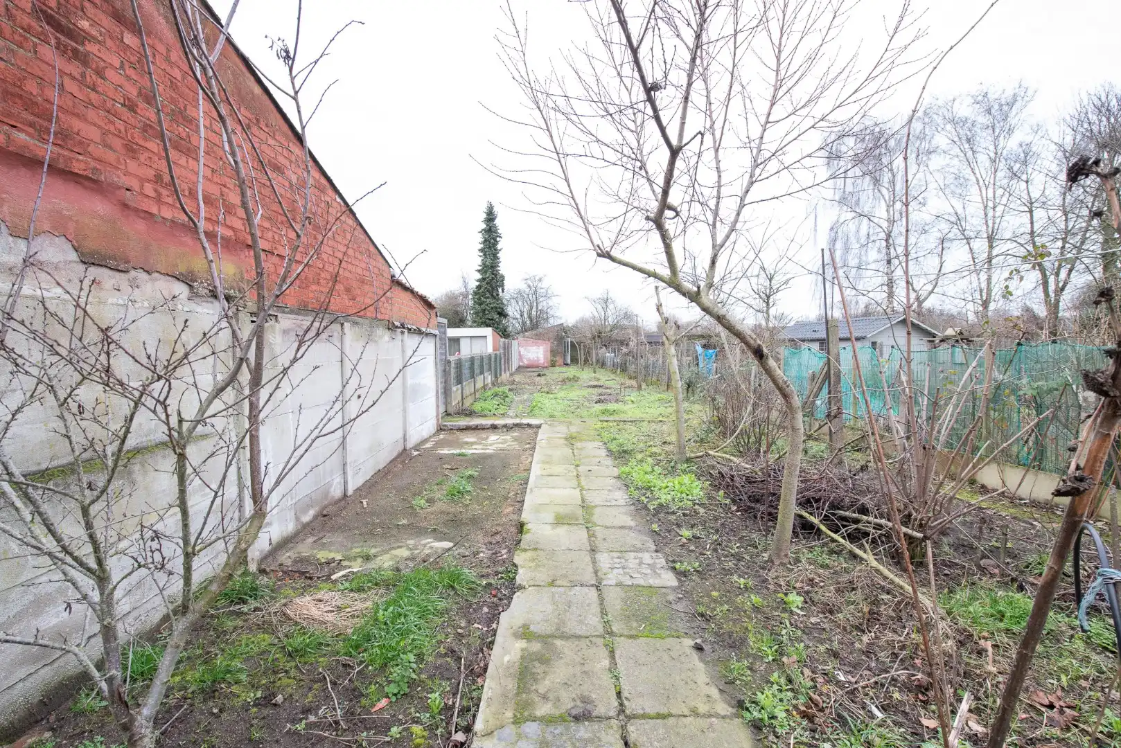 Te koop in Waregem – Halfopen bebouwing met renovatiepotentieel! foto 17