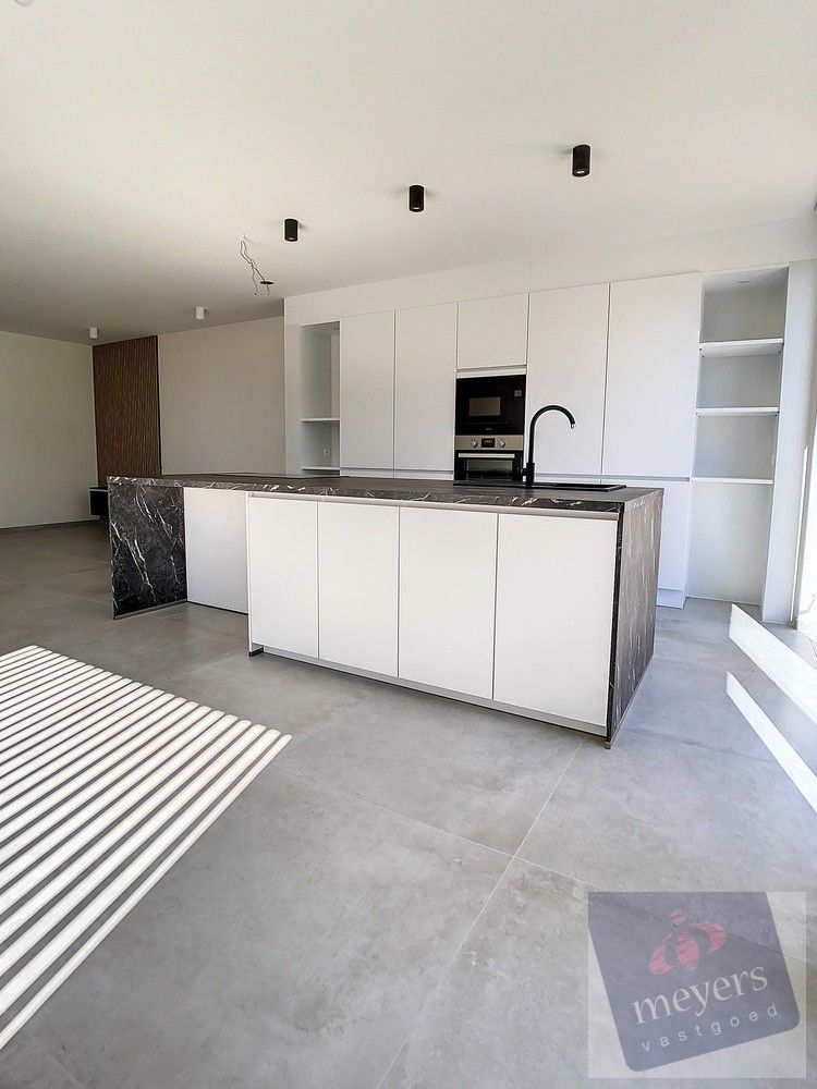 Recent en energiezuinige halfopen woning op toplocatie in Zonhoven foto 6