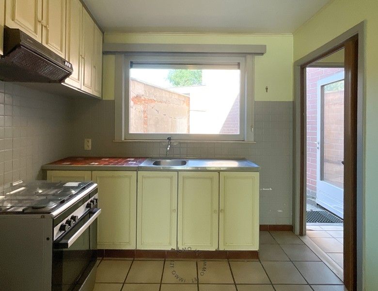 Woning met 2 slaapkamers en koer in het centrum van Sint-Gillis-Waas foto 5