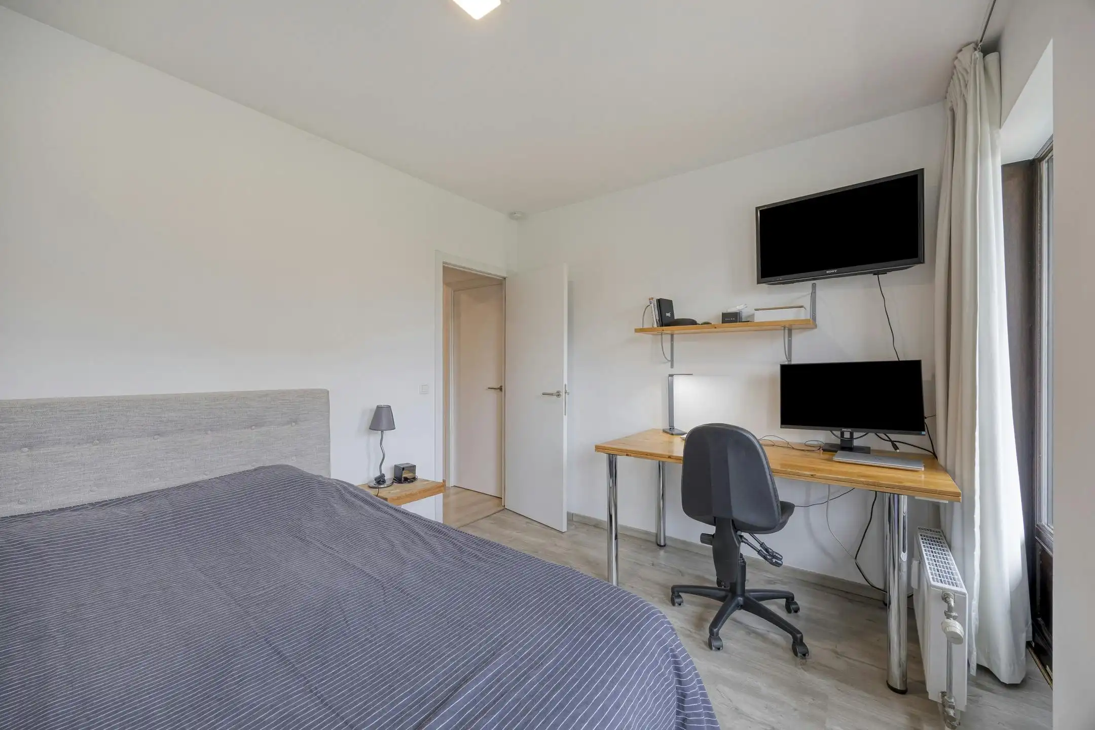 Moderne duplex met 2 slaapkamers omringd door groen in Laken foto 15