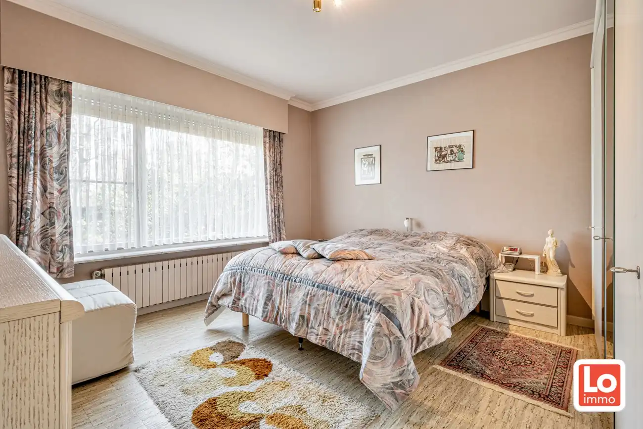 Degelijke open gelijkvloerse woning met inpandige garage en grote tuin op een groene toplocatie in Beervelde! foto 22