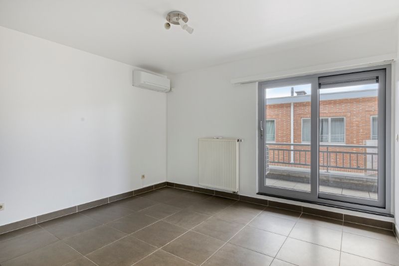 Centraal gelegen en instapklaar 2-slaapkamerappartement met terras in Mechelen foto 6