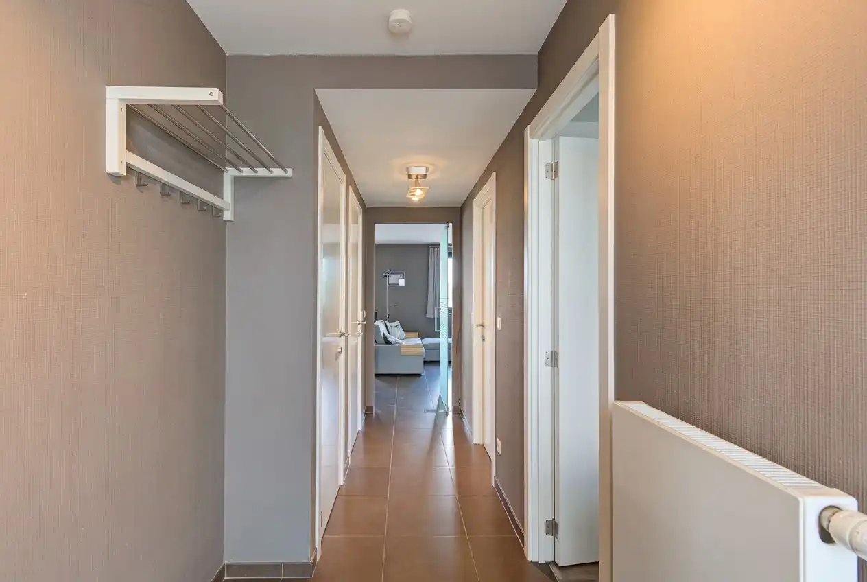 INSTAPKLAAR APPARTEMENT MET 2 SLAAPKAMERS EN AUTOTAANPLAATS NABIJ HET CENTRUM VAN BILZEN foto 2