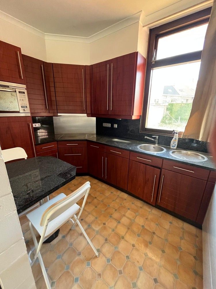 Gelijkvloerse woning met leuke stadstuin foto 2