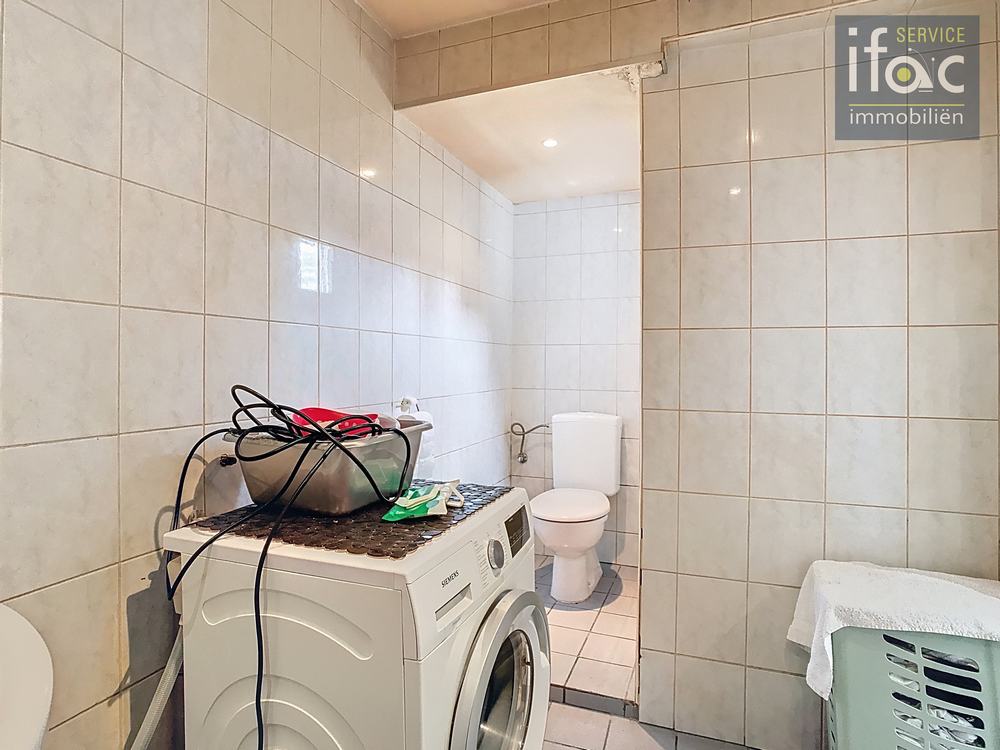 Rijhuis te koop foto 10