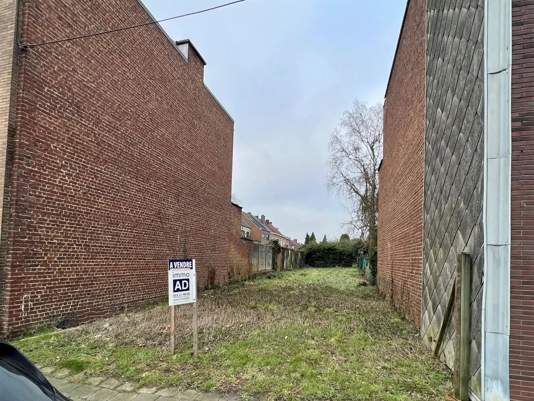 Mooi perceel bouwgrond voor stadswoning met tuin in het centrum van Ronse foto {{pictureIndex}}