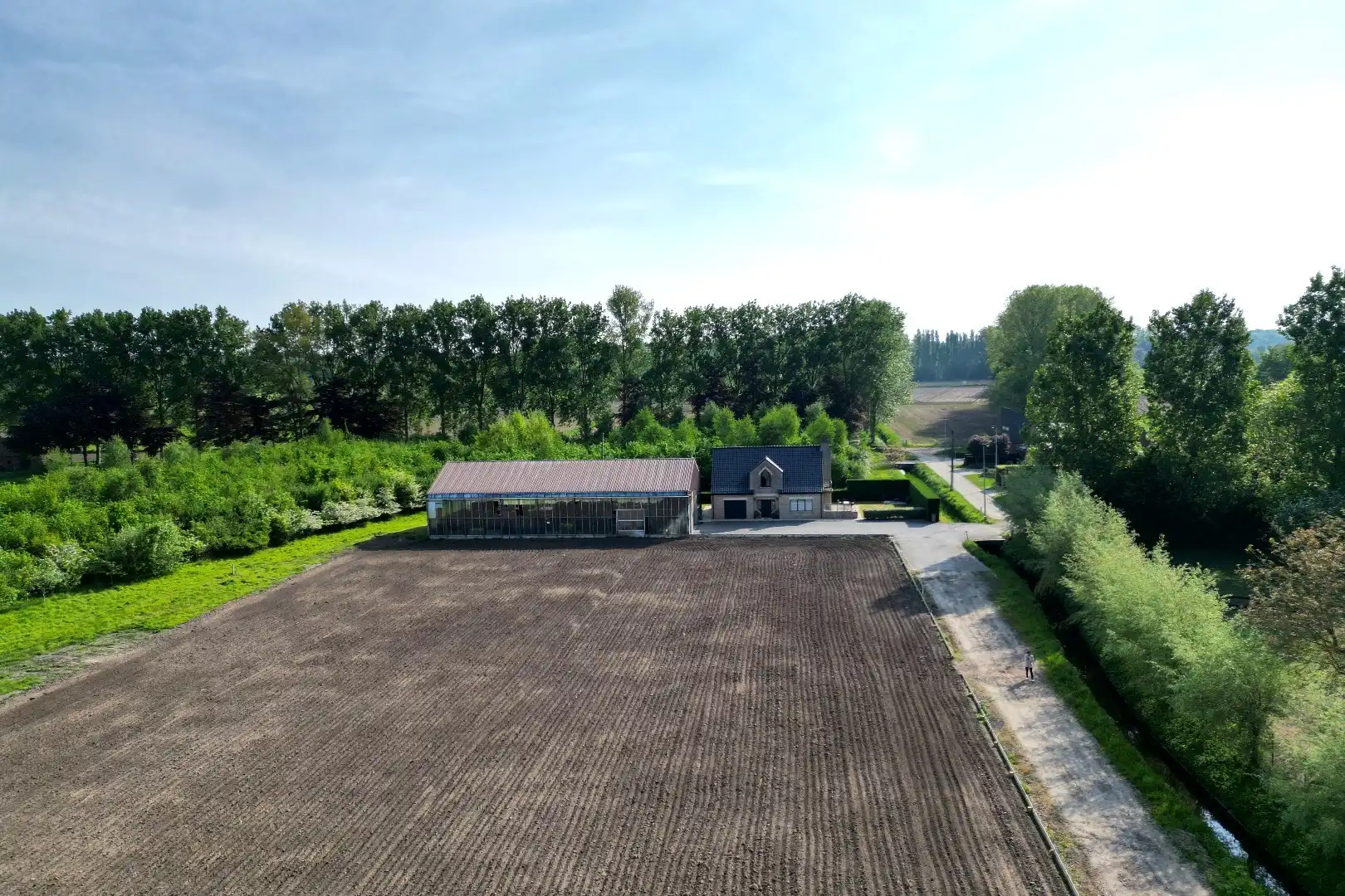 Instapklare woning met landbouwgrond in Assebroek foto 24