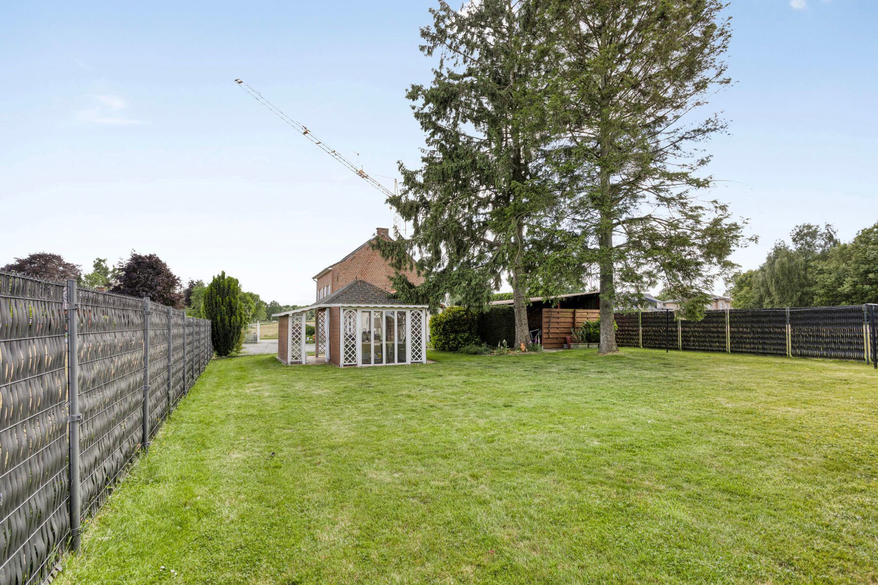 Open bebouwing met 4 slp, tuin, garage en prachtig uitzicht! foto 24
