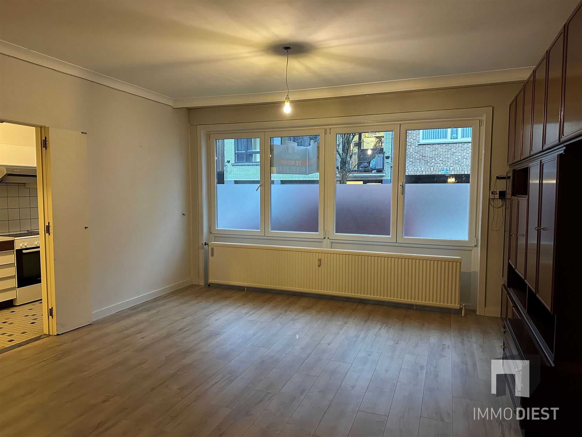 Gelijkvloers appartement met koer en 2 ruime slaapkamers foto 2