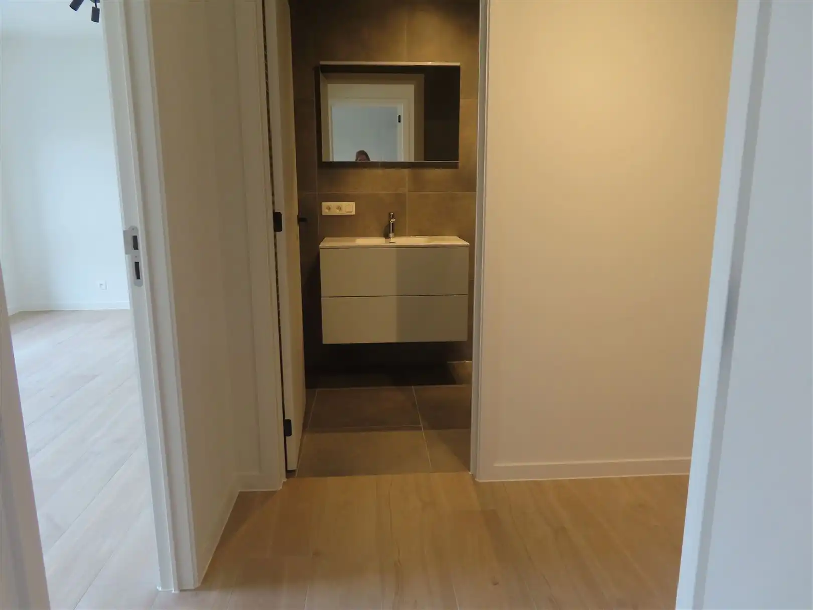 Prachtig nieuwbouwappartement met 2slpk, 2 badk, terras & P foto 8