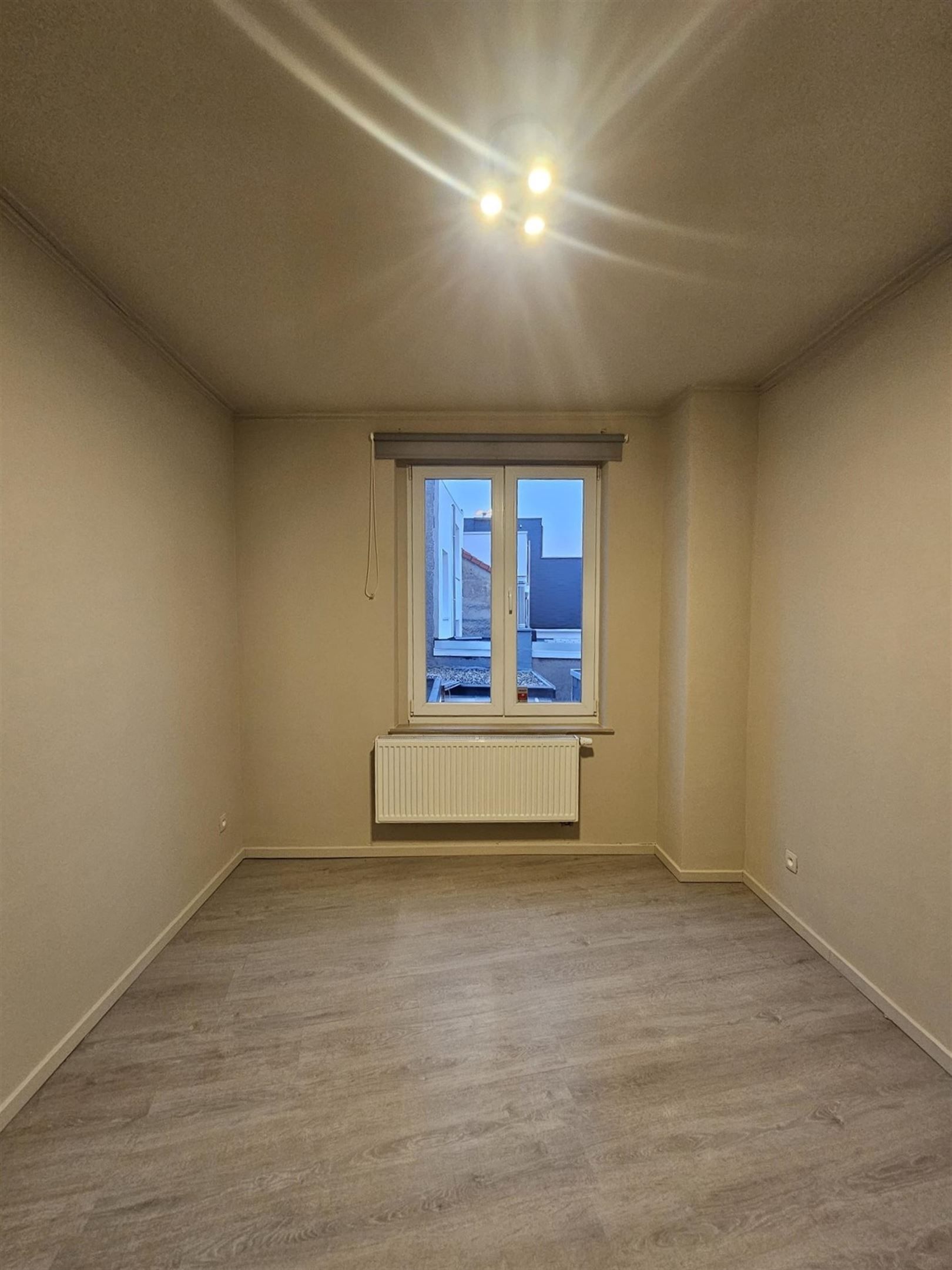 Gunstig gelegen ruime woning met stadskoer. foto 11