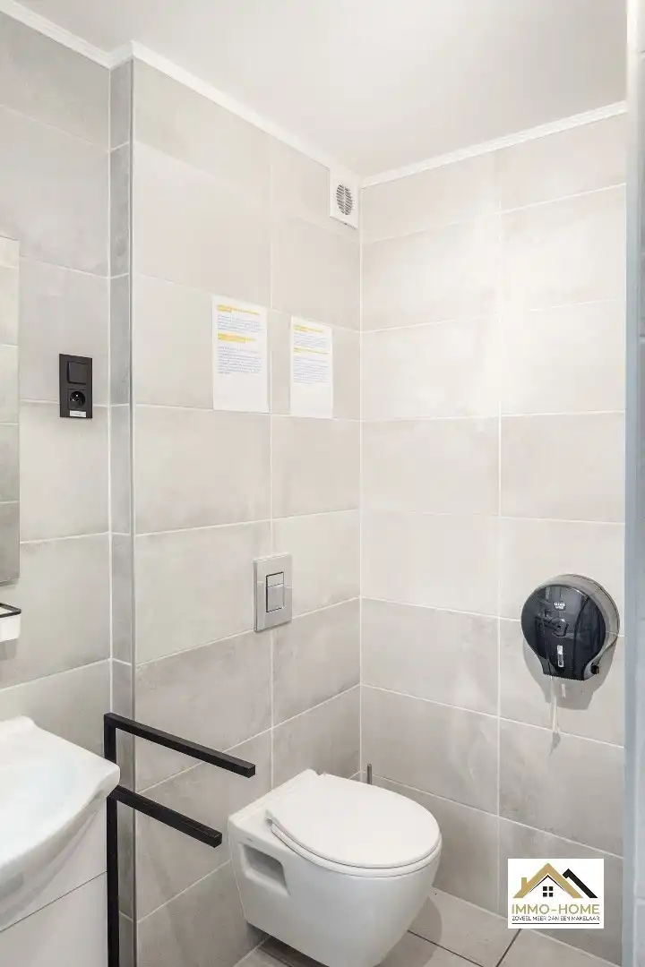 Zeer ruim gelijkvloers appartement met woonkelder en private tuin  foto 16