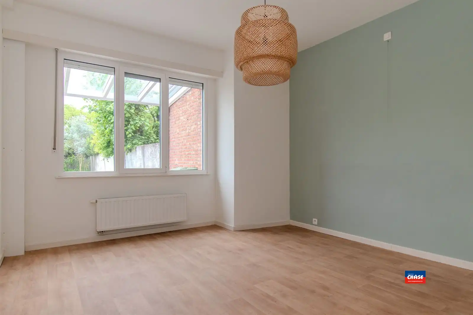 Bel-étage met 2 slaapkamers, garage, tuin en zonnepanelen. EPC B foto 3