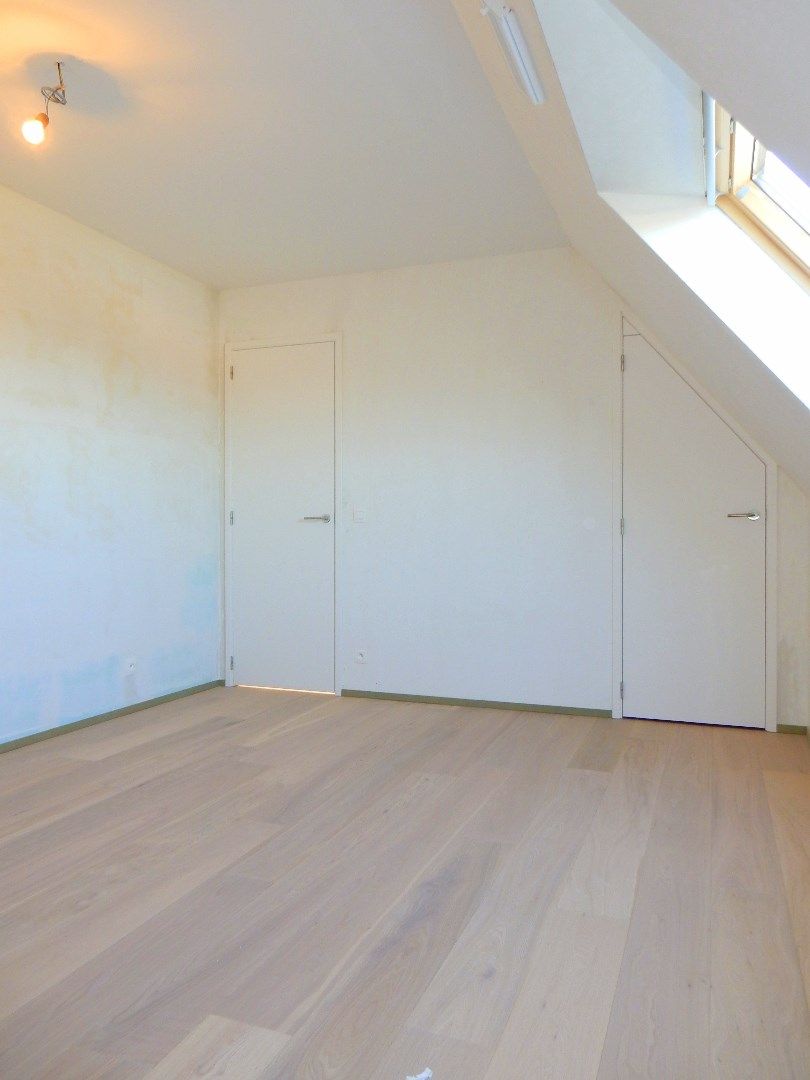 Ruim appartement met 3 slaapkamers en dubbele garagebox foto 13