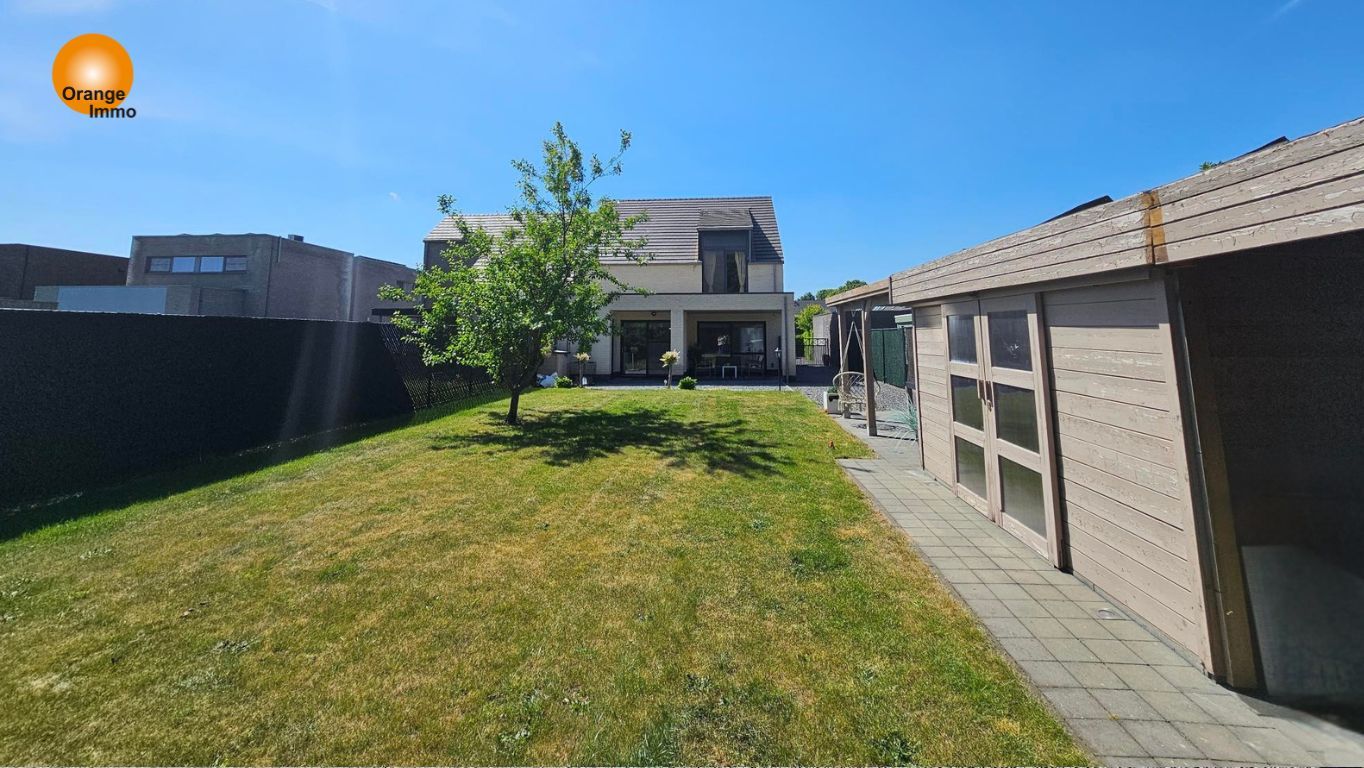 Knappe moderne woning met een mooie tuin  in Dilsen-Stokkem. foto 11