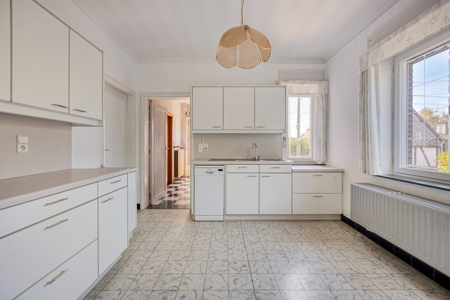 Op te frissen woning met 3 slaapkamers, garage en tuin foto 10
