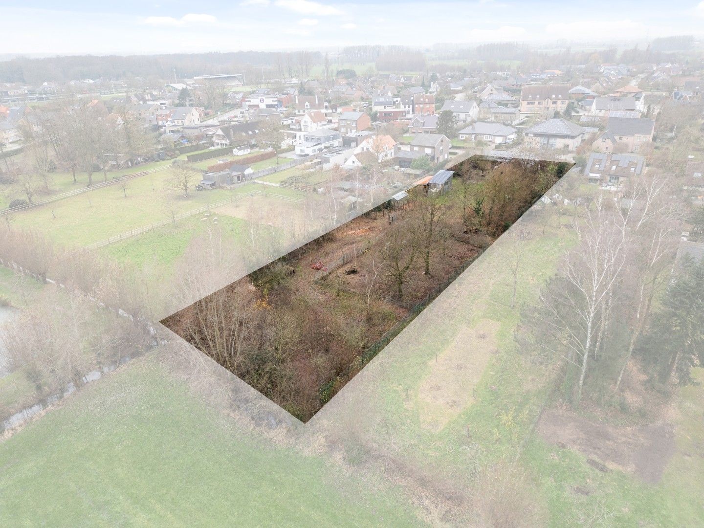 Bouwgrond van 2.193 m² te koop in Lievegem foto {{pictureIndex}}