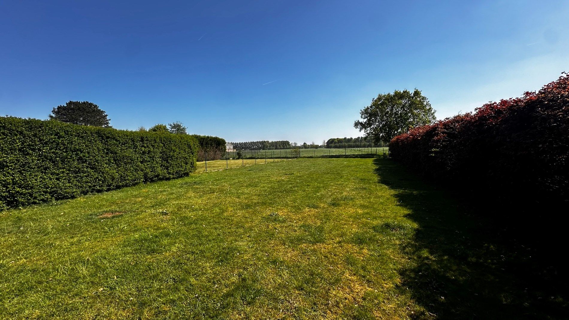 Ruime halfopen bebouwing met tuin, garage en 4 slaapkamers in Lokeren foto 8