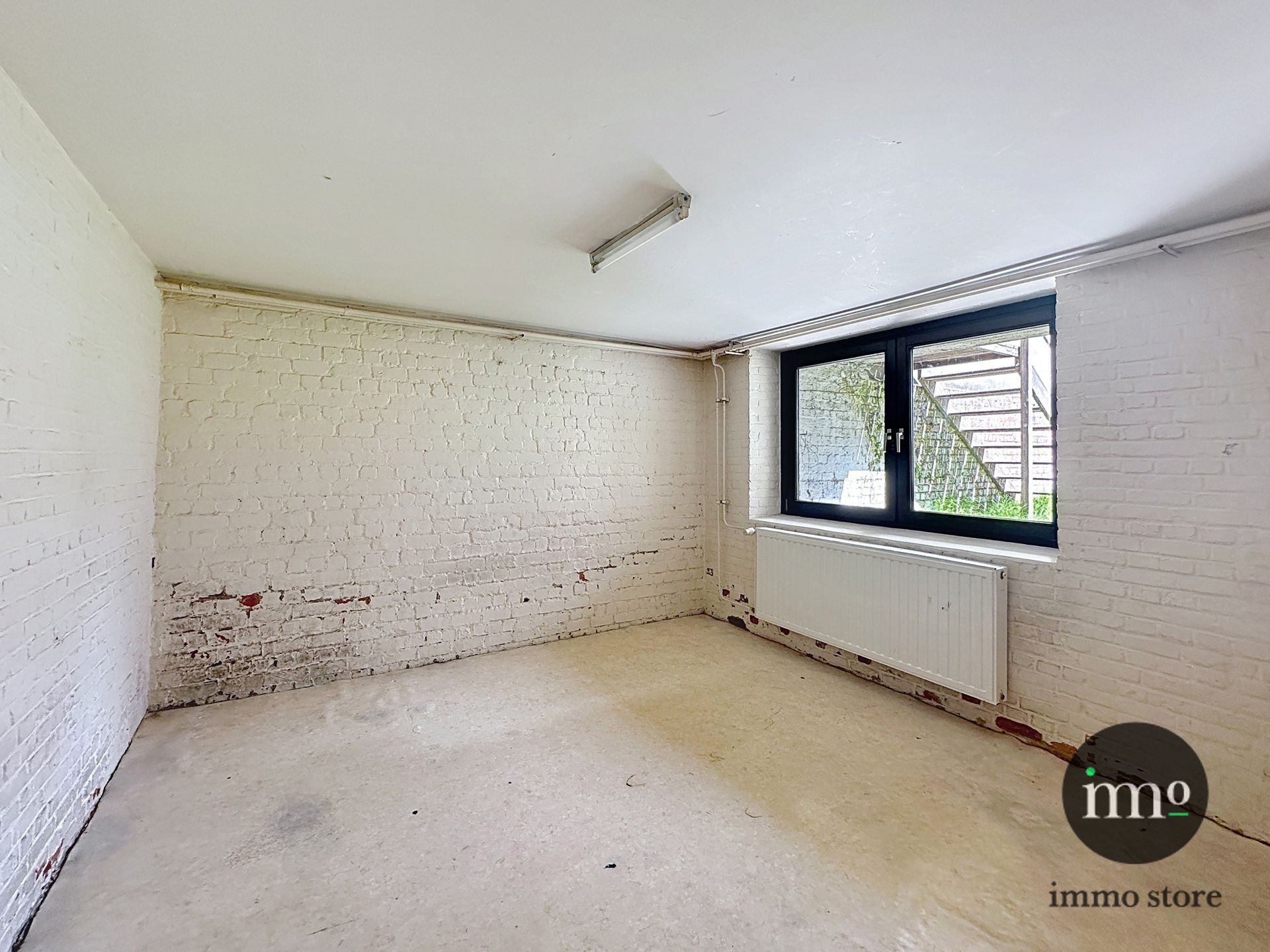 Goedgelegen rijwoning met 3, mogelijks 4 slaapkamers en tuin foto 15