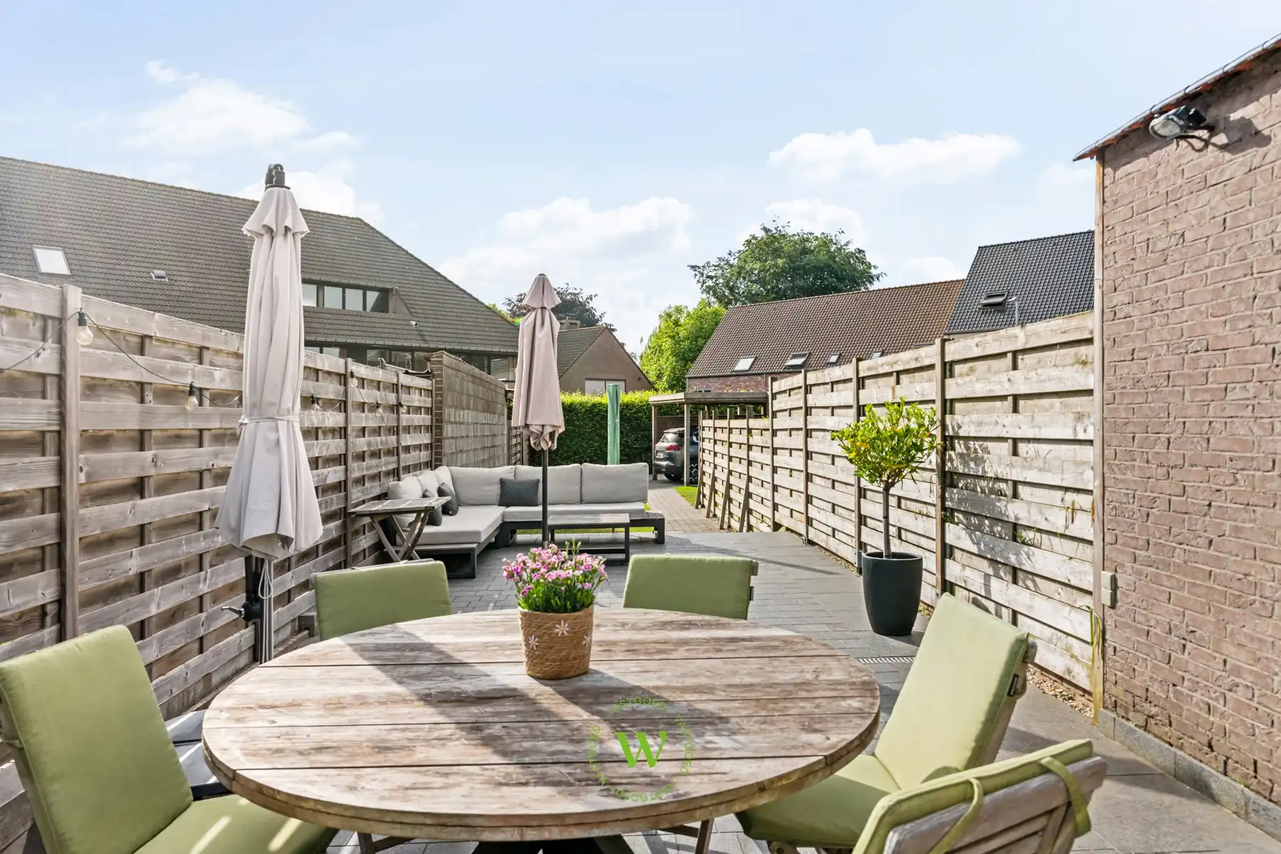 Energiezuinige gezinswoning met zonnige tuin en carport foto 8