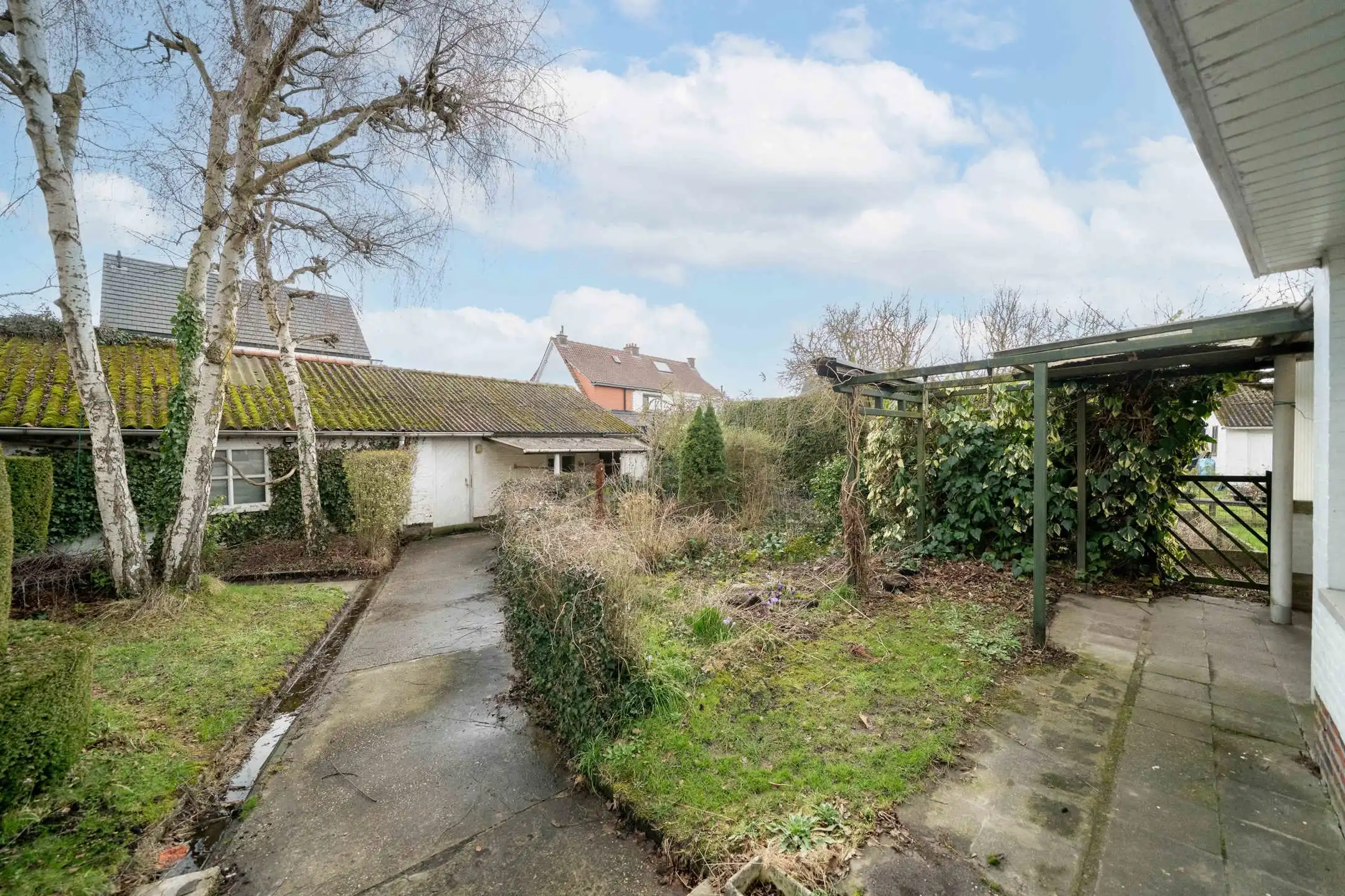 Woning op een ruim hoekperceel van 7a25ca in rustige woonwijk te Sint-Katelijne-Waver foto 9