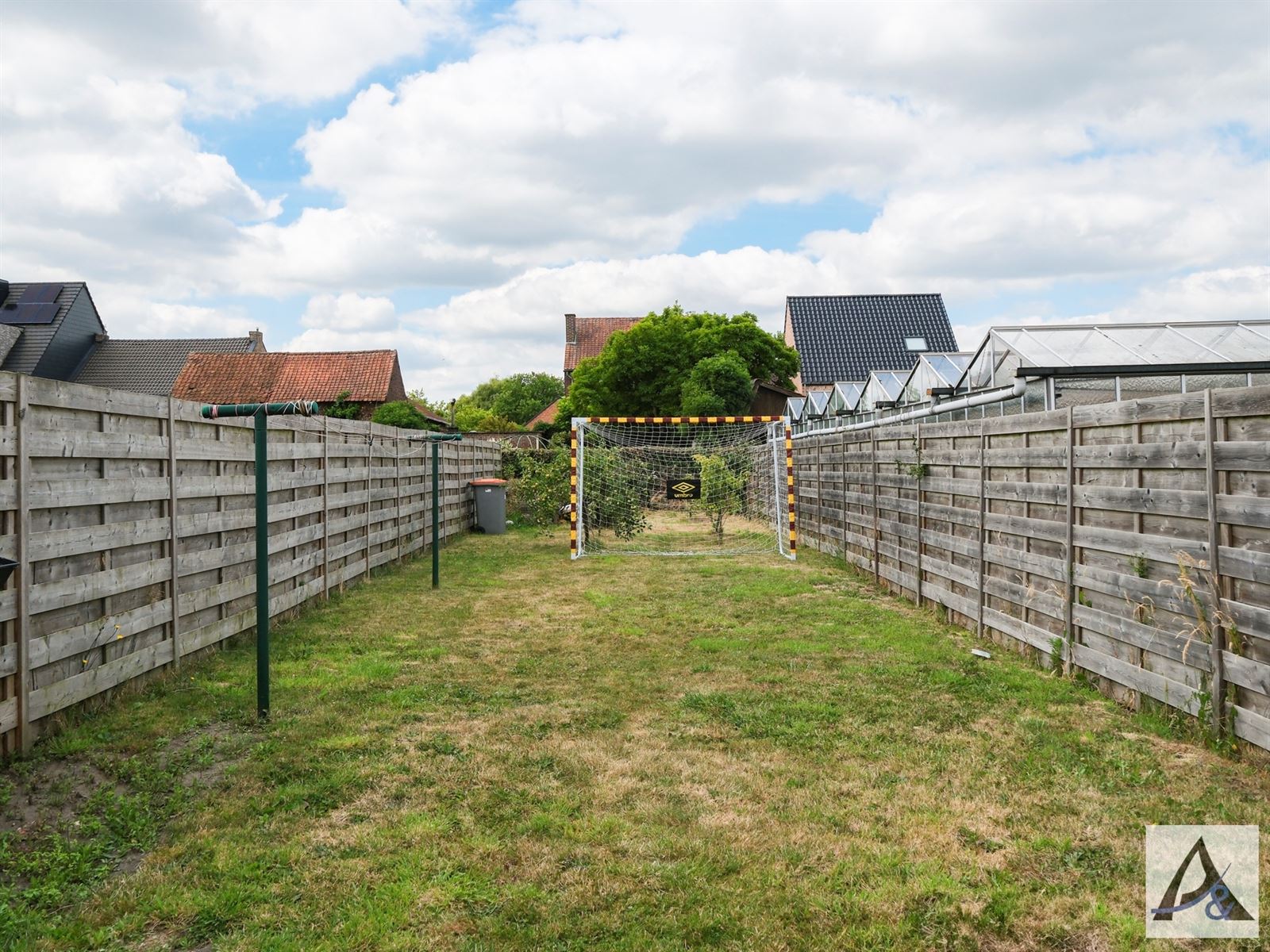 Instapklare gezinswoning met tuin en garage in hartje Munsterbilzen foto 6