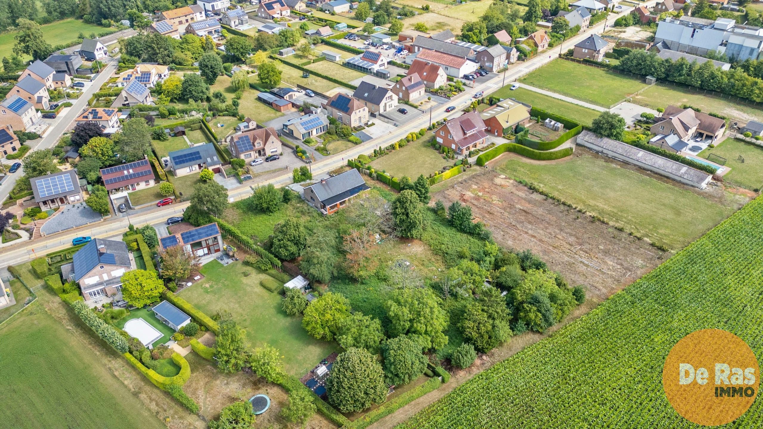 BEKKEVOORT - Zuidgerichte bouwgrond in groene omgeving foto 8