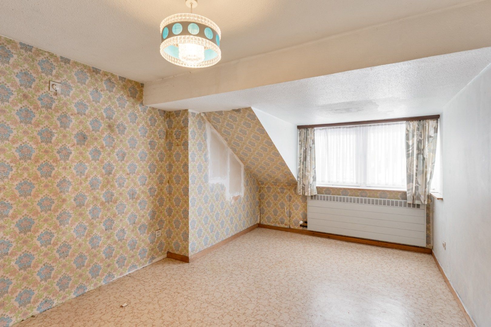 Centraal gelegen gebouw bestaande uit een handelspand op het gelijkvloers en een bovenliggend duplex-appartement! foto 23