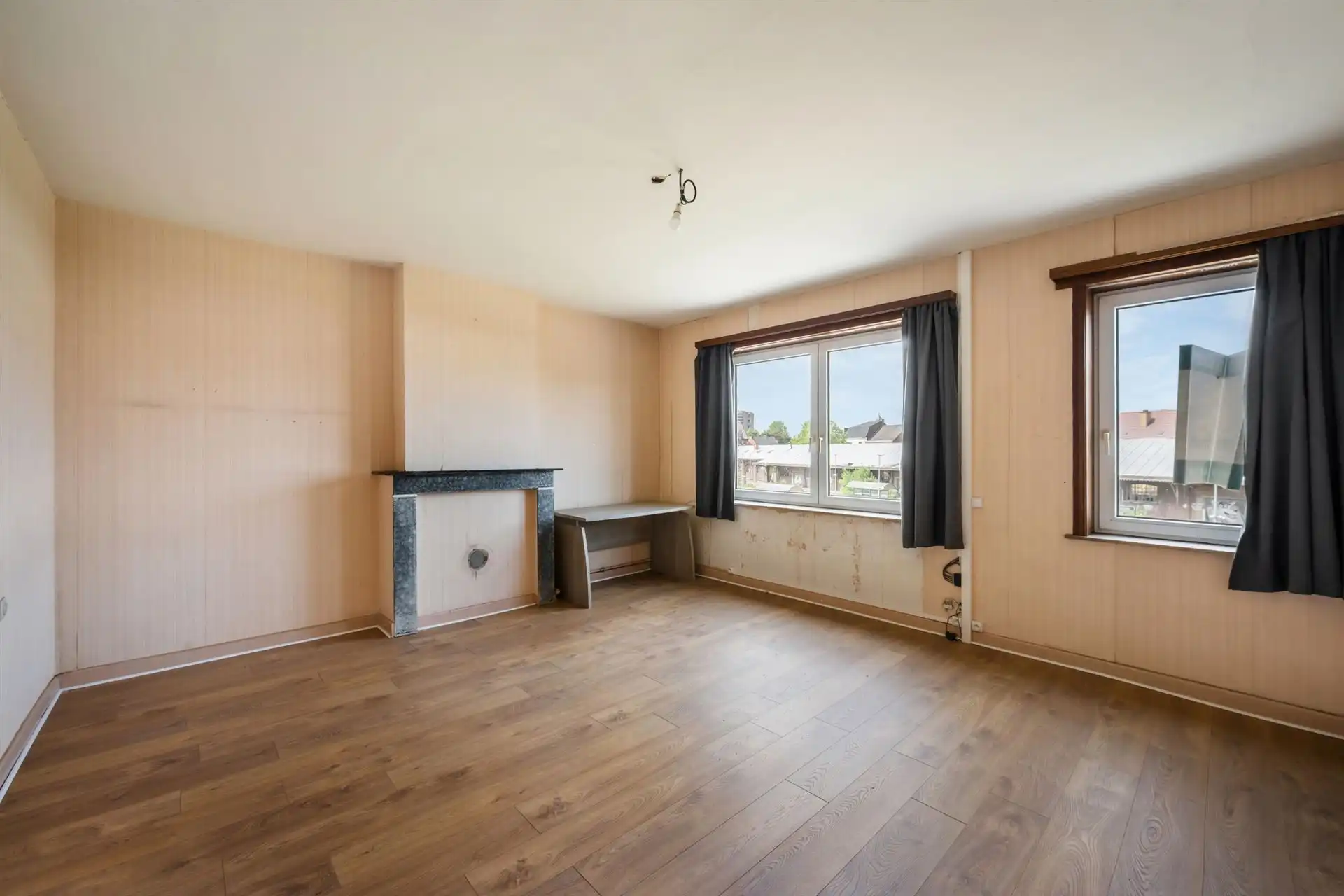 Te renoveren woning met 3 SLK, stadstuin en veel potentieel foto 12