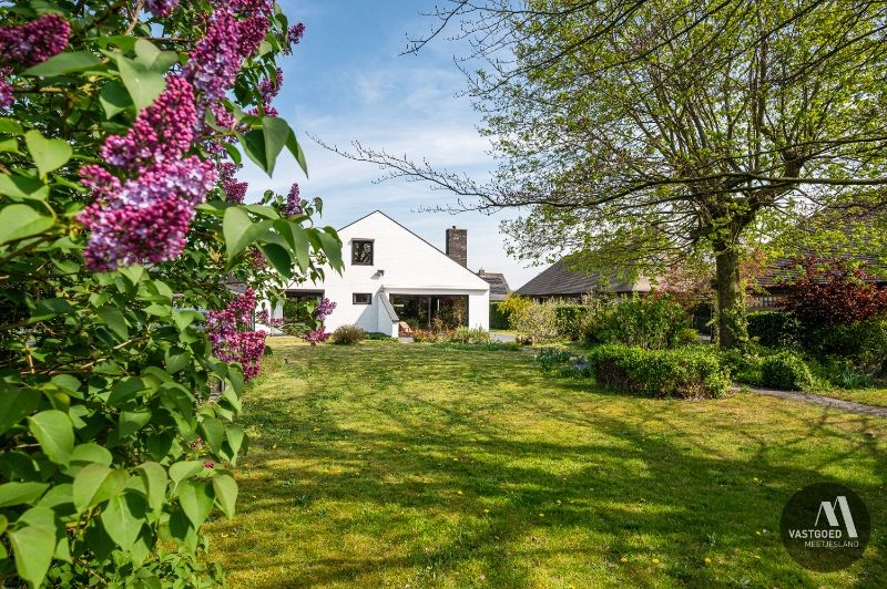 Tijdloze woning met een prachtige tuin. foto 25
