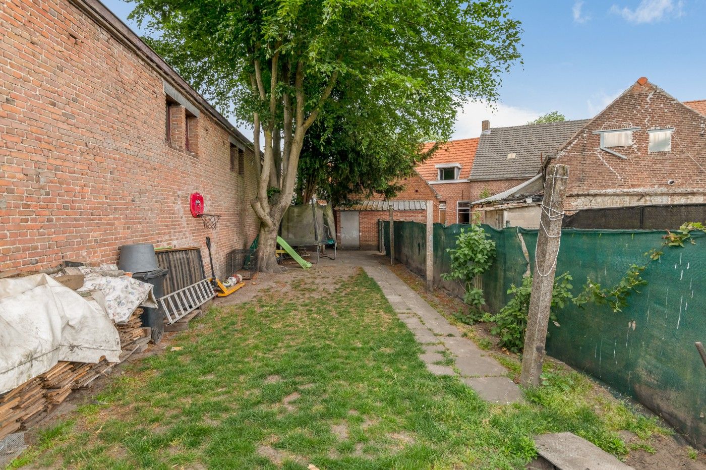 Te renoveren woning met 3 slpk. en tuin foto 21