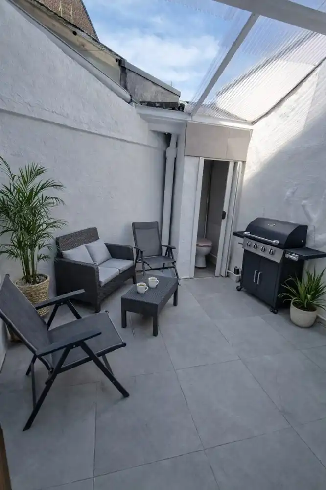 Lichtrijke hoekwoning in hartje Sint-Truiden foto 25