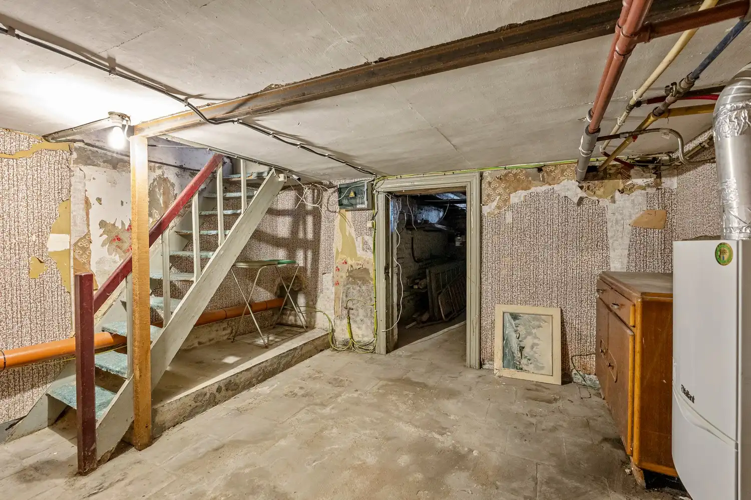 Goed gelegen rijwoning met 2 slaapkamers en een af te werken zolderruimte te Leuven! foto 18