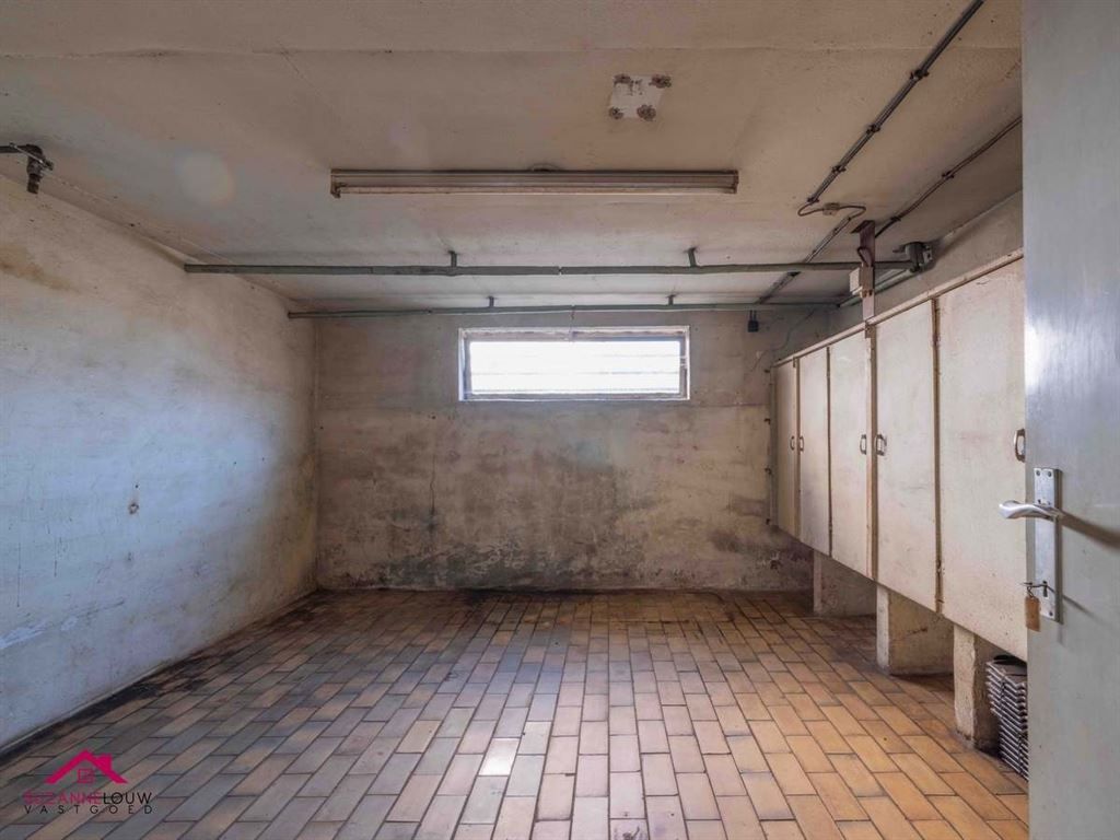 Vrijstaande, op te frissen woning foto 34