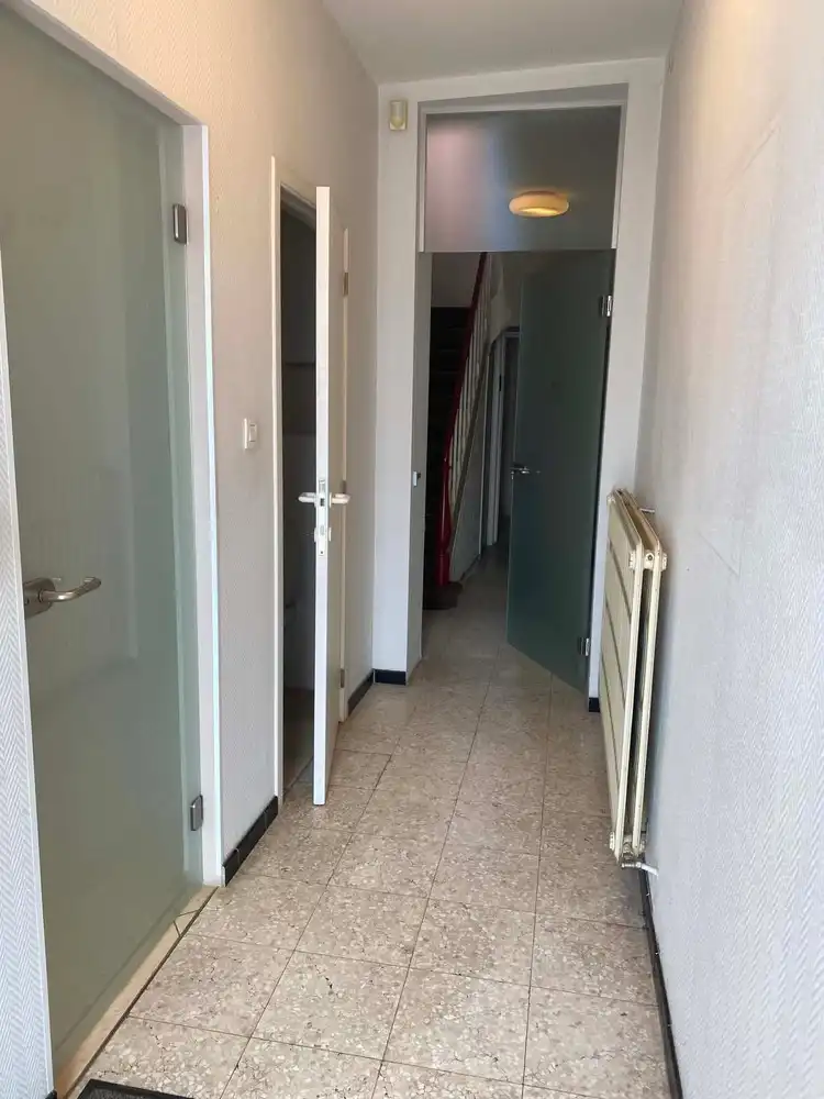 Centraal gelegen woning met tuin en ruime inrichtbare zolder foto 5