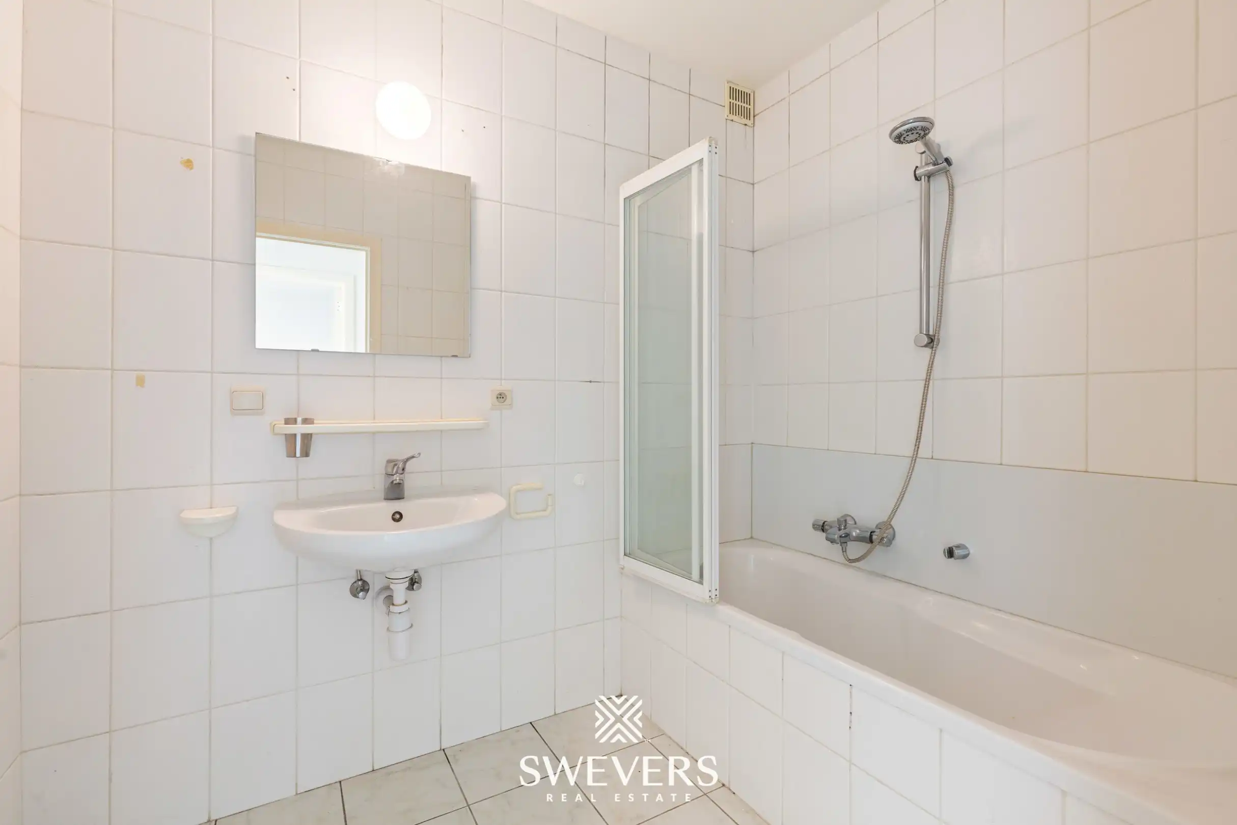 Gelijkvloers 2 slaapkamer appartement met terras en grote binnentuin foto 10