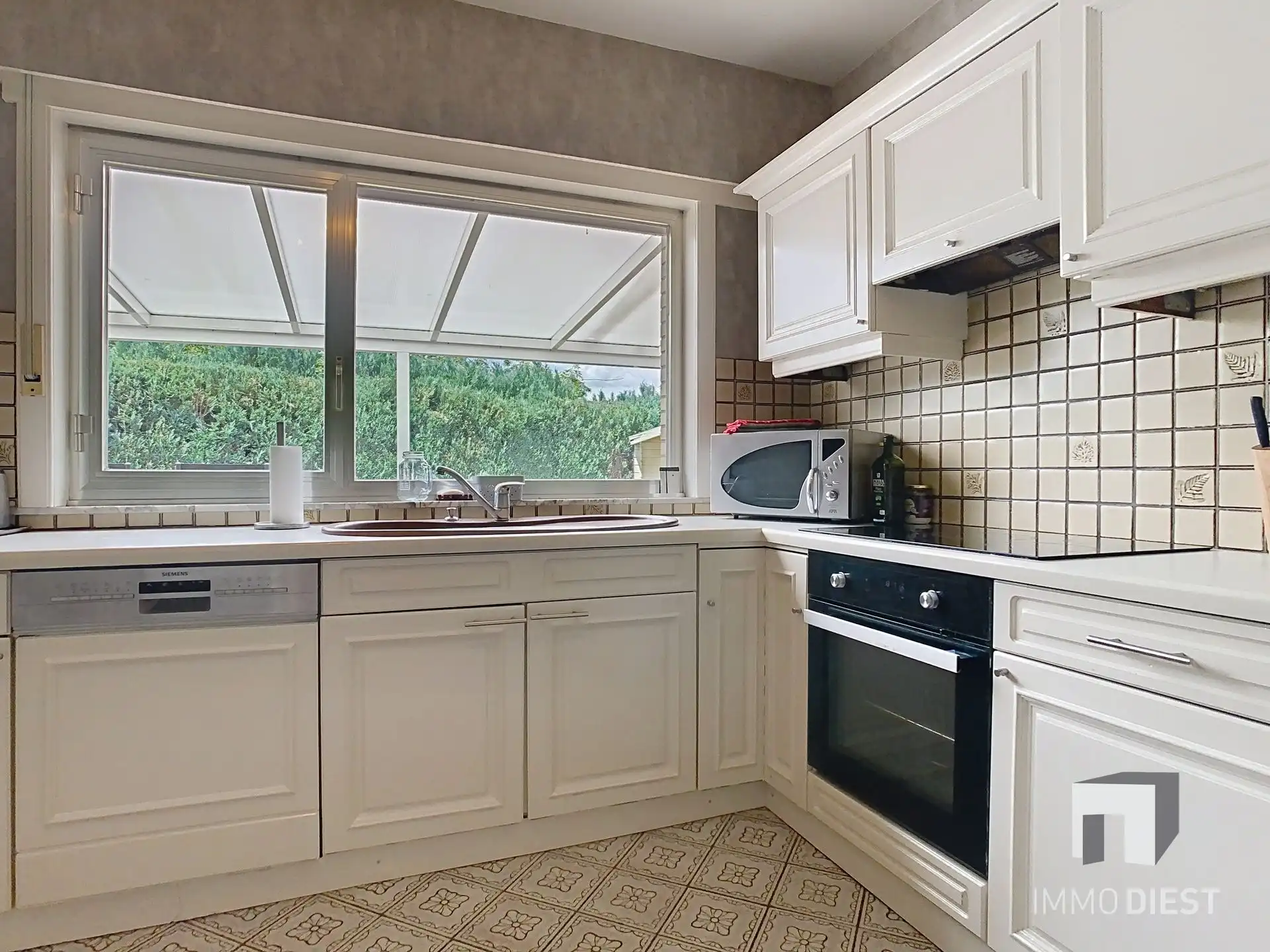 Gelijkvloerse instapklare woning met grote tuin op ca. 39a foto 15