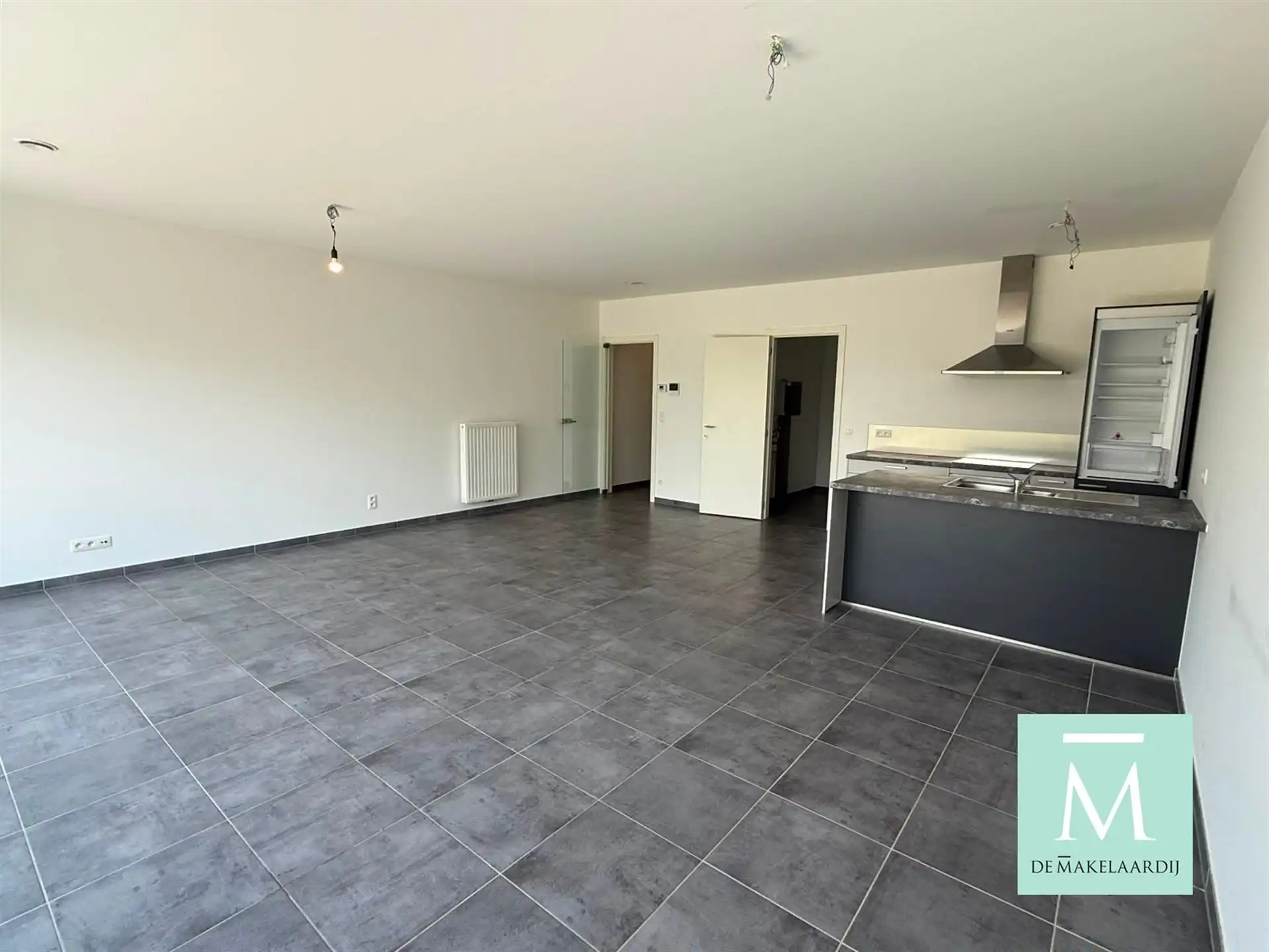 Nieuwbouwappartement met 2 slaapkamers en tuin! foto 2