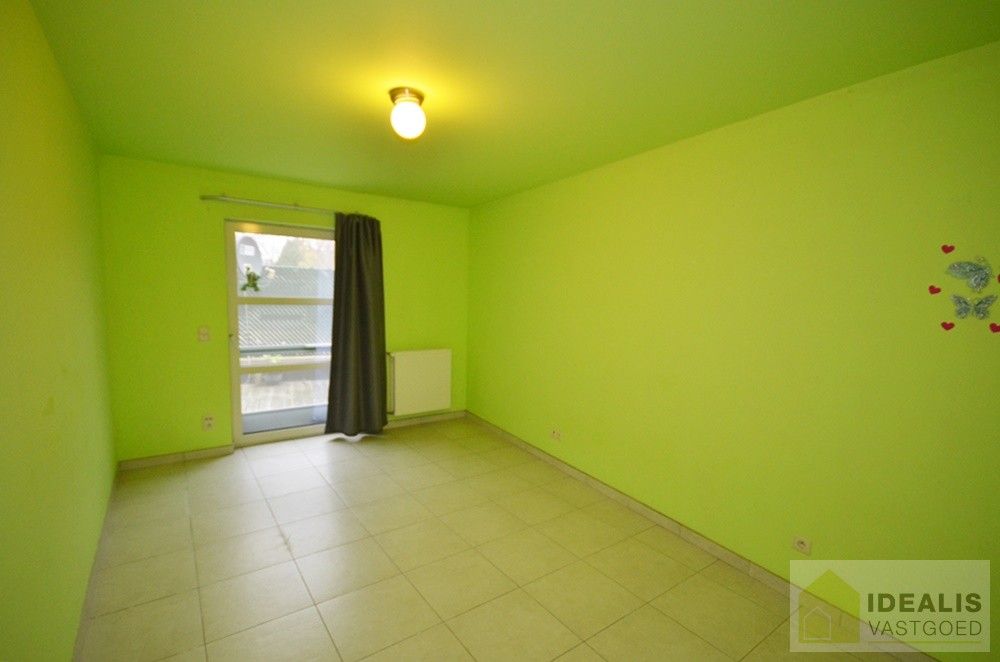 Ruim en aangenaam appartement pal in het centrum van Neerpelt! foto 15