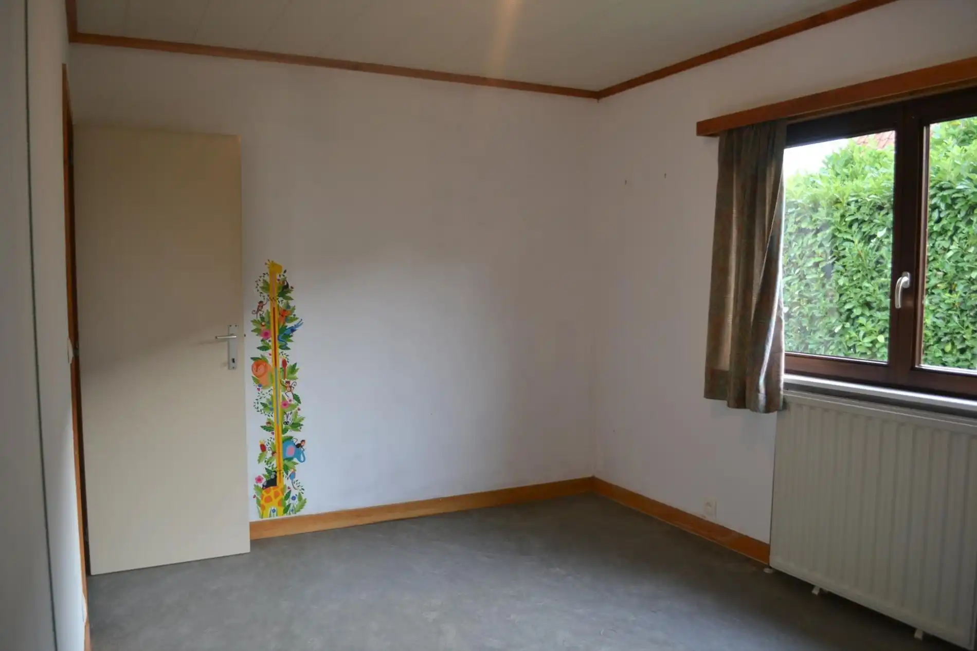Rustig gelegen gelijkvloerse woning met tuin en garage foto 6