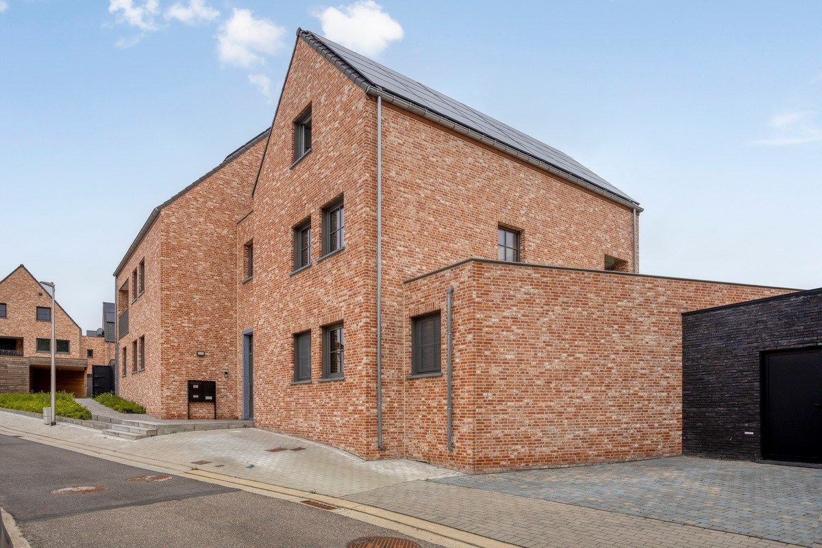 Gelijkvloers appartement met tuin en parkeerplaats foto 3