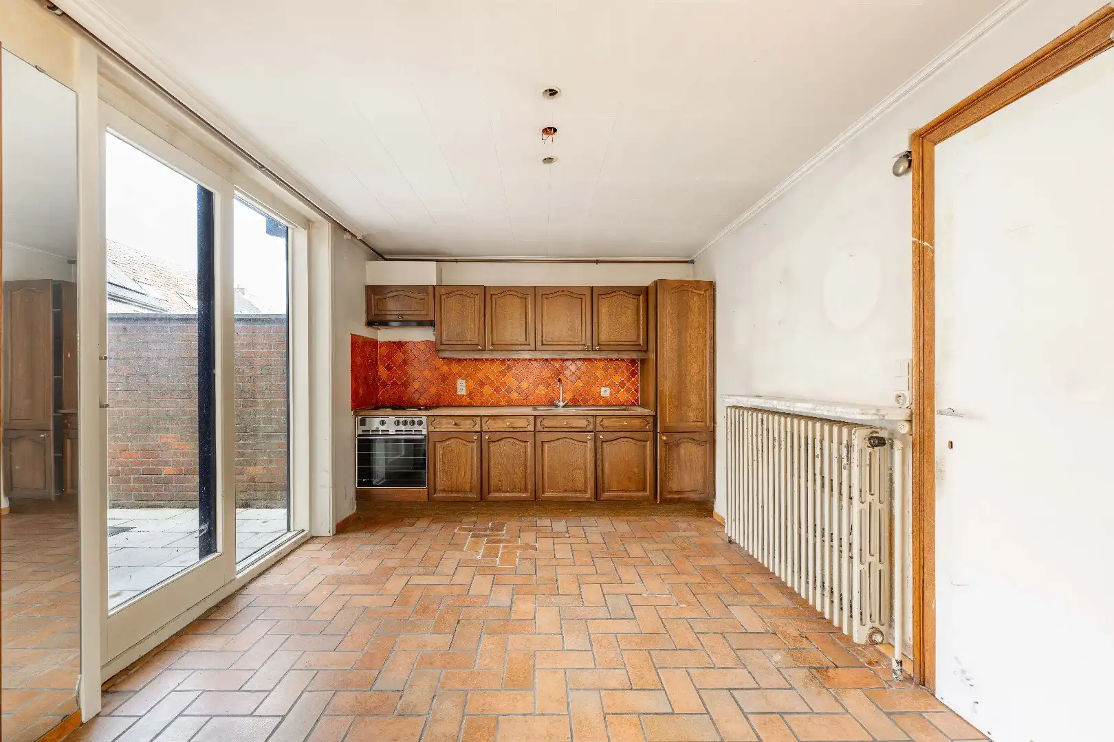 Te renoveren woning met tal van potentieel in centrum Aarsele foto 8