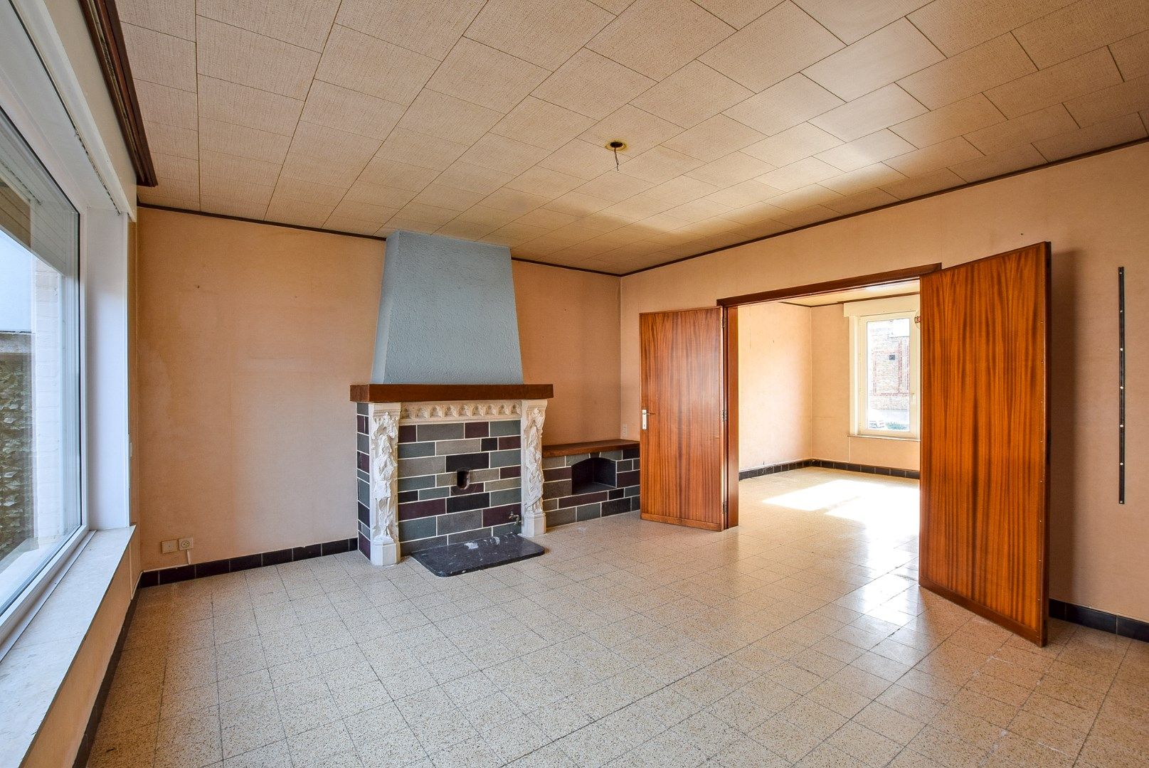Ruime woning momenteel opgedeeld in 2 appartementen met inpandige garage en tuin op 240m². foto 5