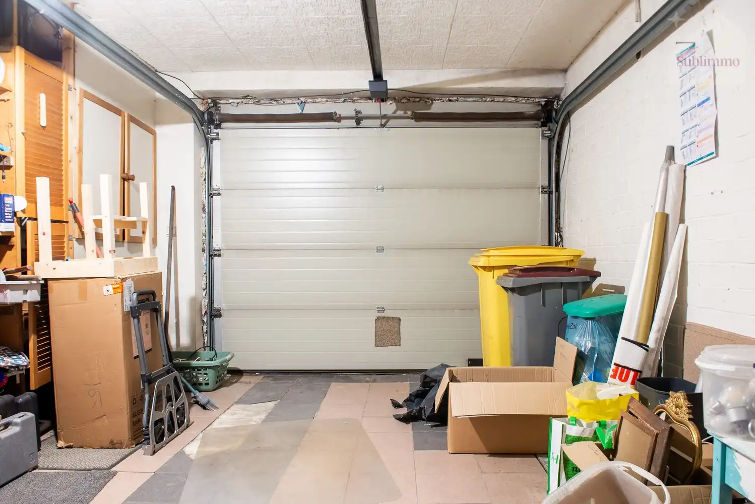 Opbrengsteigendom met 2 appartementen, tuin en garages te koop in Mol centrum foto 11
