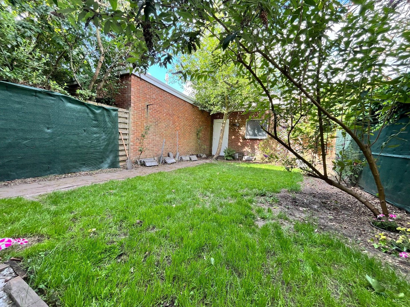 Comfortabel 2 slpk-appartement met tuin foto 13